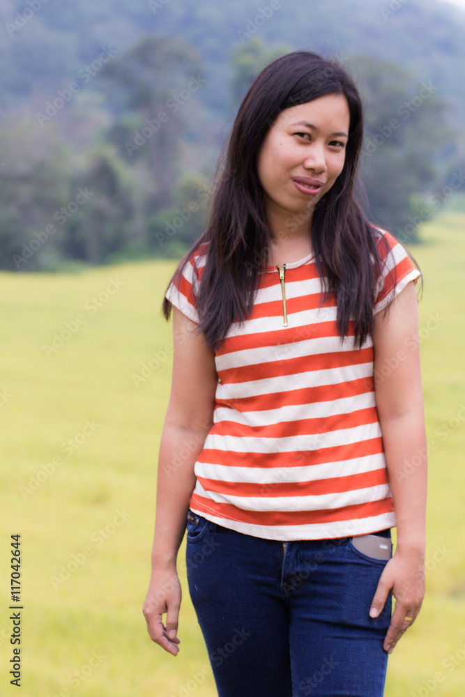 asian woman with rice field in Thailand asian woman with rice field in Thailand