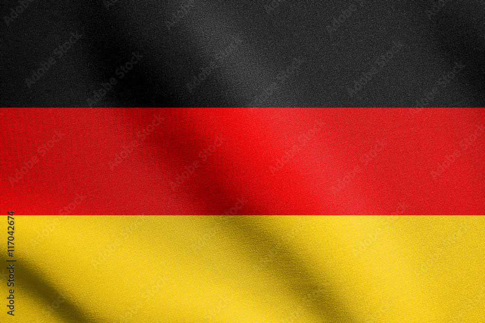 Flag of Germany waving in wind with fabric texture Flag of Germany waving in wind with fabric texture