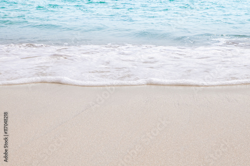 View of nice tropical beach with white sand and blue water