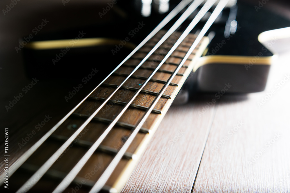 Fototapeta premium Body of a classic black bass guitar