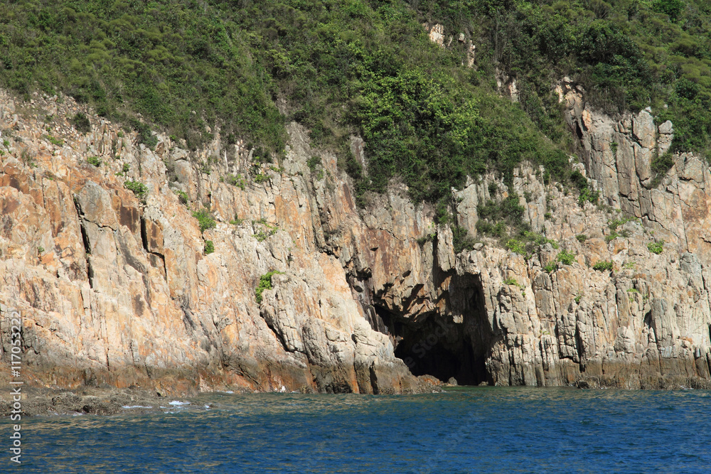 island with volcanic rock columns of Hong Kong Geological Park