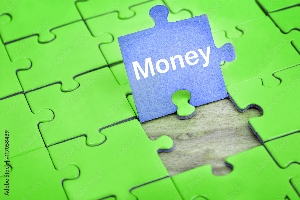 Fototapeta premium Puzzle with word Money