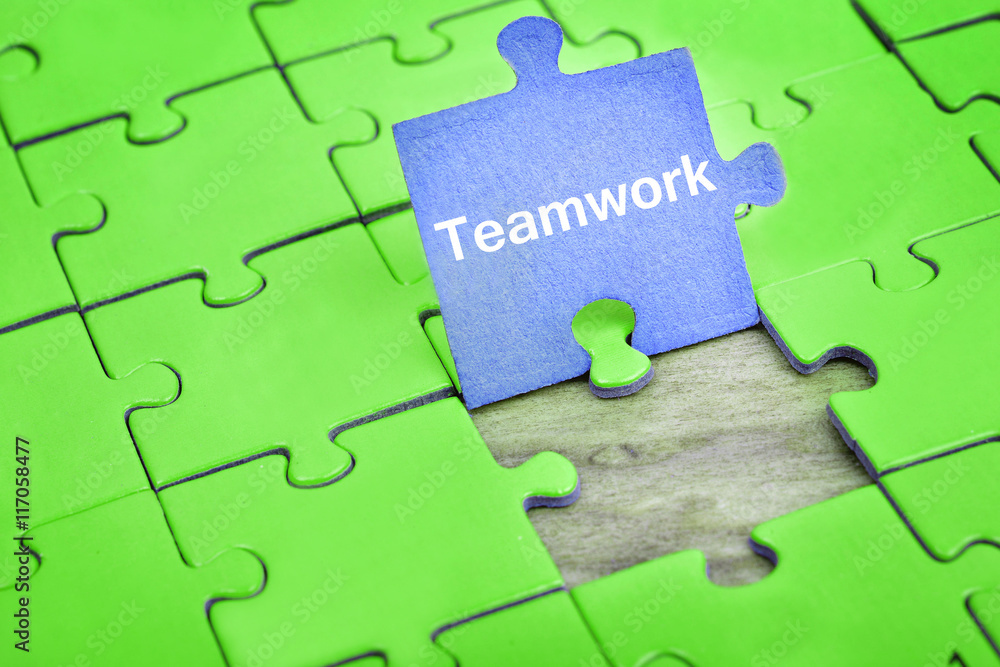 Fototapeta premium Puzzle with word Teamwork