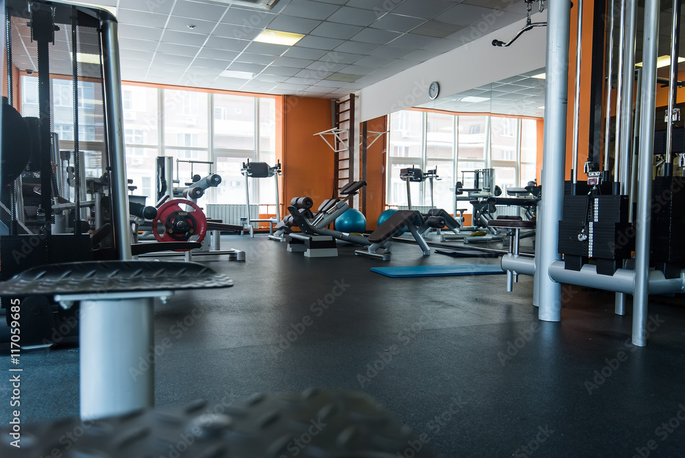 Diverse training equipment at the gym room Diverse training equipment at the gym room