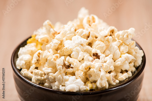 closeup popcorn in bowl on wood table