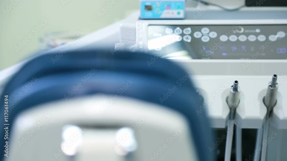 Workplace of dentist with dental unit and chair closeup. Workplace of dentist with dental unit and chair closeup.