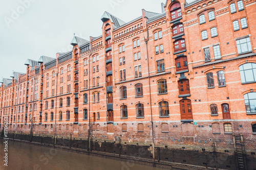 Row of historic Gothic style red brick warehouses