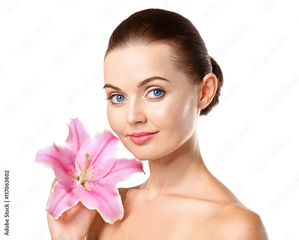 Portrait of beautiful girl with lily, isolated on white. Spa concept Portrait of beautiful girl with lily, isolated on white. Spa concept