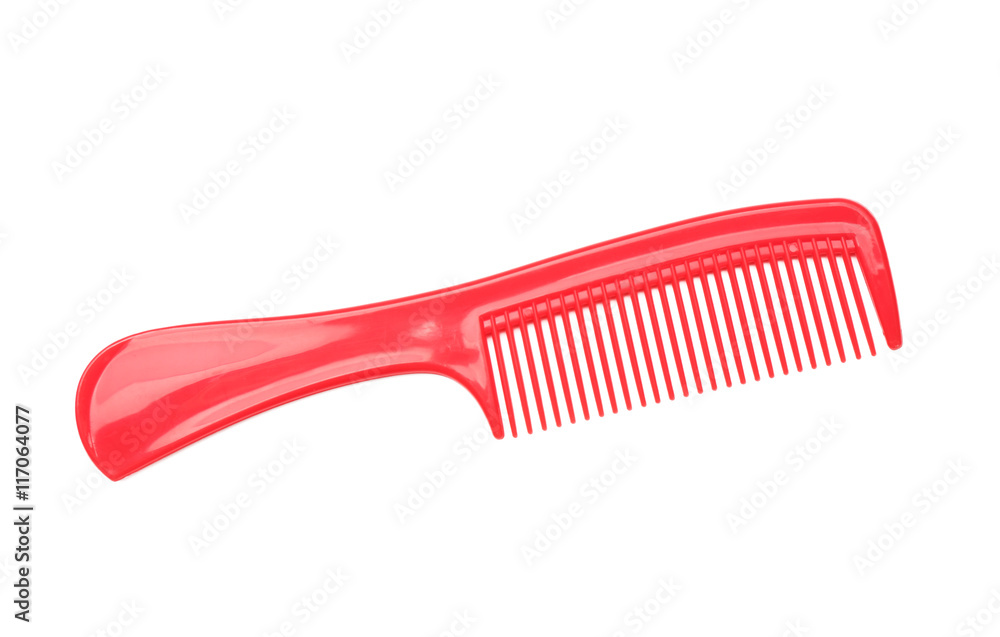 Red plastic comb isolated on white Red plastic comb isolated on white