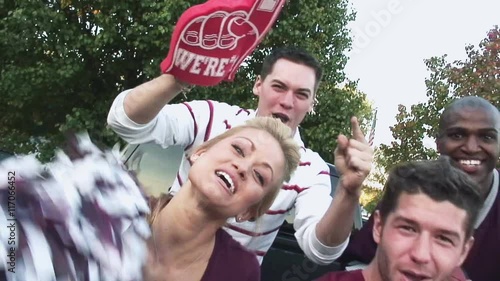 Tailgating Football Fans Cheering For Their Team 