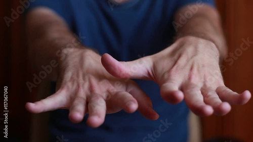 Man with tremored hands