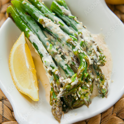 green asparagus in lemon sauce photo