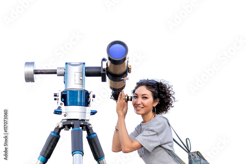 Young woman looking through astronomy telescope isolated on white background