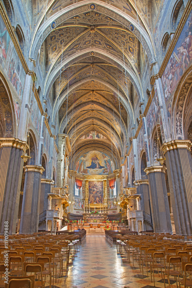 CREMONA, ITALY - MAY 25, 2016: The gothic nave of Cathedral with the renaissance frescoes.