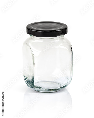 Clear glass bottle with black cap isolated on white background