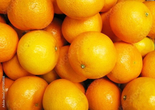 Mandarin orange fruit close up bright colorful background