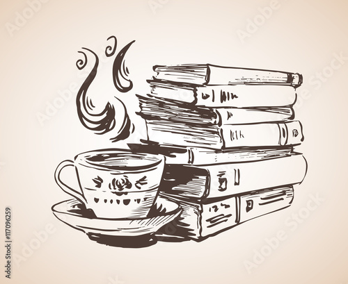 Pile of books with cup of tea.