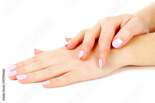 Female hand with manicure on a white background