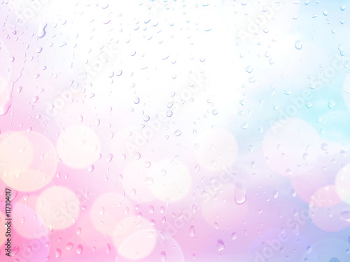 raindrops on glass bokeh wi...