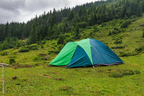 Camping tent at Carpathian mountains  summertime journey  Ukraine  Europe.