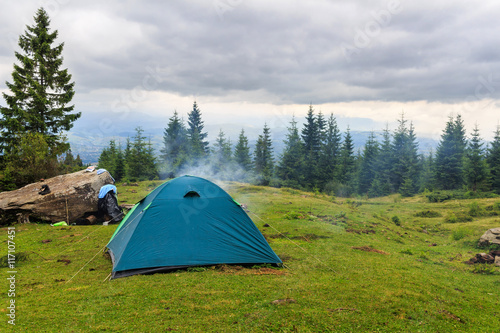 Camping tent at Carpathian mountains, summertime journey, Ukraine, Europe.