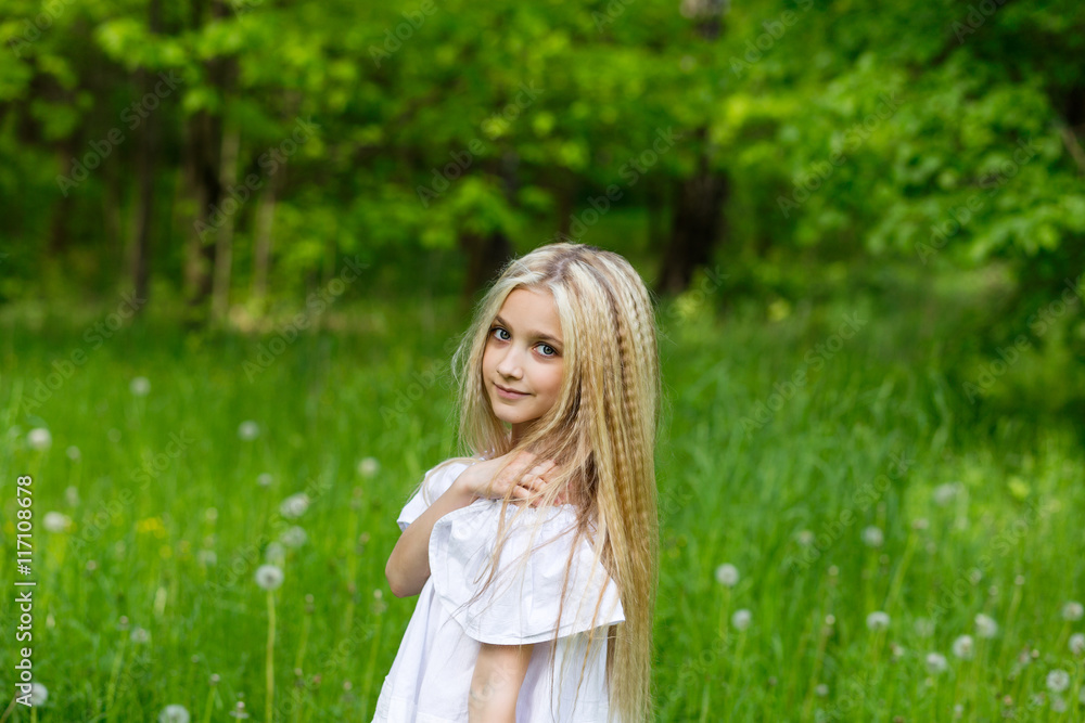 Portrait cute blonde girl outdoors in summer Portrait cute blonde girl outdoors in summer