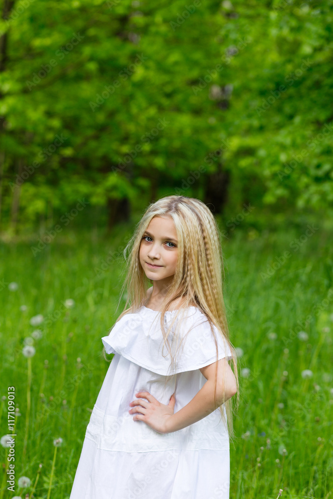 Portrait cute blonde girl outdoors in summer Portrait cute blonde girl outdoors in summer