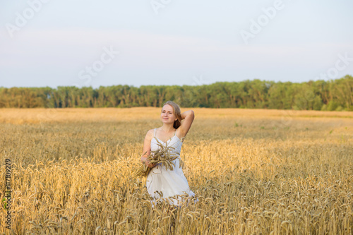 pregnant woman outdoors in summer
