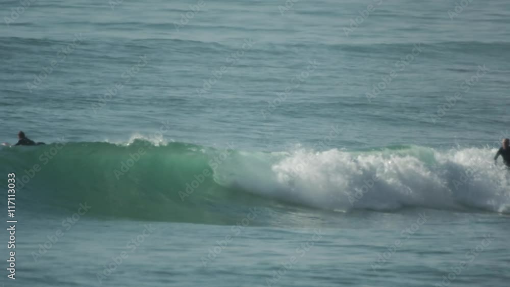 surfers in the ocean atlantic coast morocco surfers in the ocean atlantic coast morocco