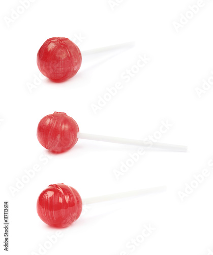 Red lollipop candy isolated