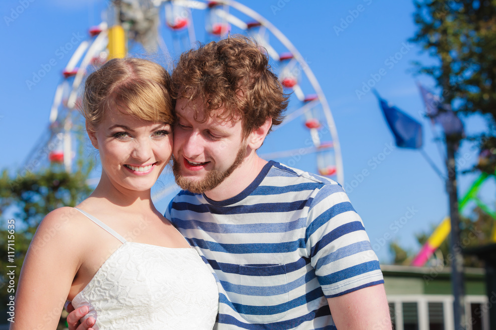tourists loving couple outdoor in amusement park tourists loving couple outdoor in amusement park