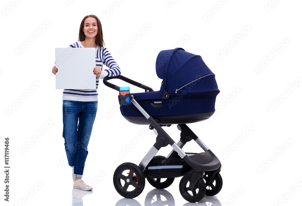 Full length portrait of a mother with a stroller holding blank, isolated on white background Full length portrait of a mother with a stroller holding blank, isolated on white background