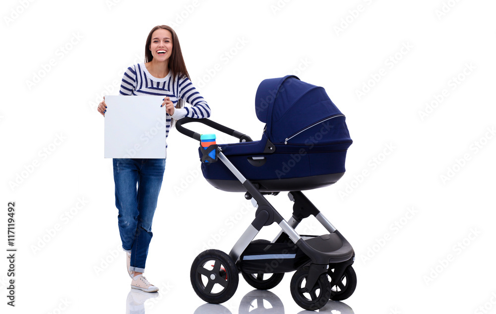 Full length portrait of a mother with a stroller holding blank, isolated on white background Full length portrait of a mother with a stroller holding blank, isolated on white background