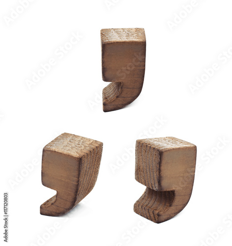 Wooden comma symbol isolated