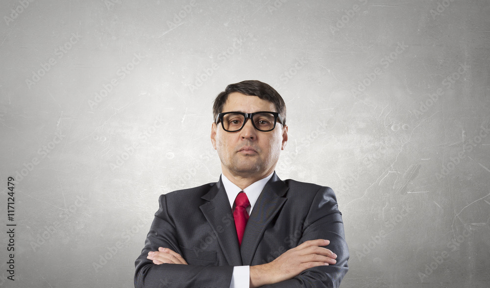 Experienced adult businessman . Mixed media Experienced adult businessman . Mixed media