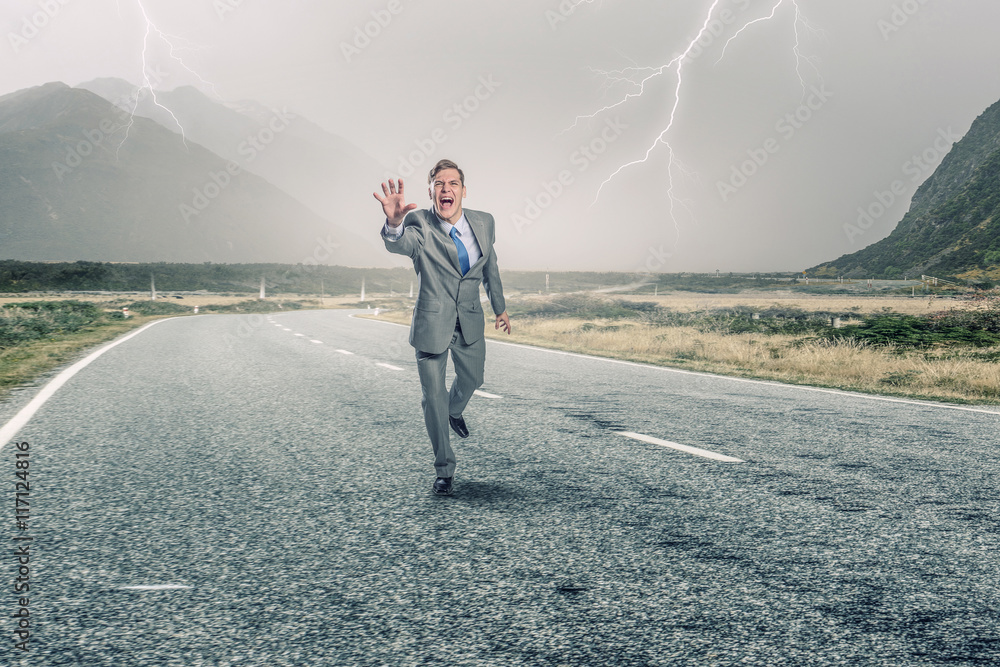 Emotional running businessman . Mixed media Emotional running businessman . Mixed media
