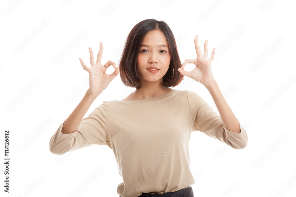 Asian business woman show double OK hand sign and smile Asian business woman show double OK hand sign and smile