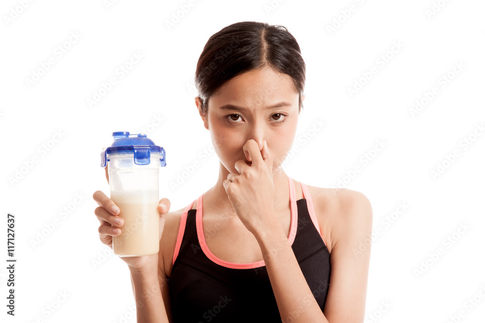 Beautiful Asian healthy girl hate whey protein smell Beautiful Asian healthy girl hate whey protein smell
