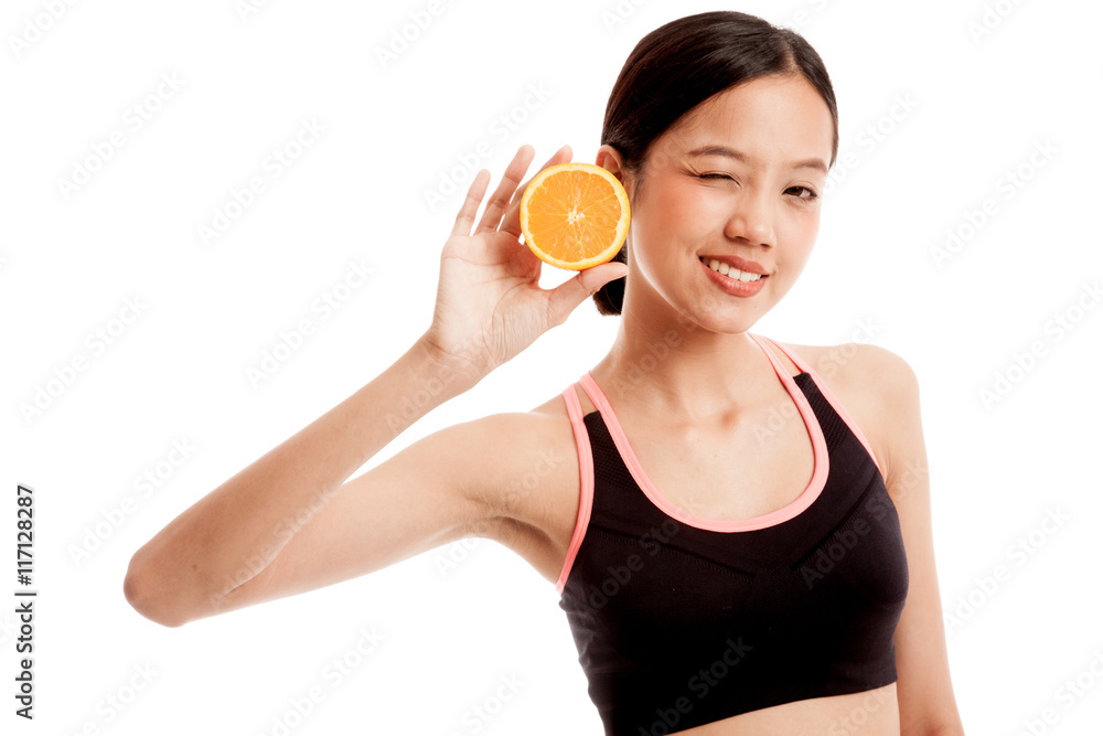 Asian healthy girl on diet with orange fruit Asian healthy girl on diet with orange fruit