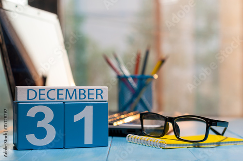 December 31st. Day 31 of month, calendar on workplace background. New year at work concept. Winter time. Empty space for text photo