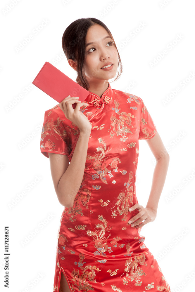 Asian girl in chinese cheongsam dress with red envelope Asian girl in chinese cheongsam dress with red envelope
