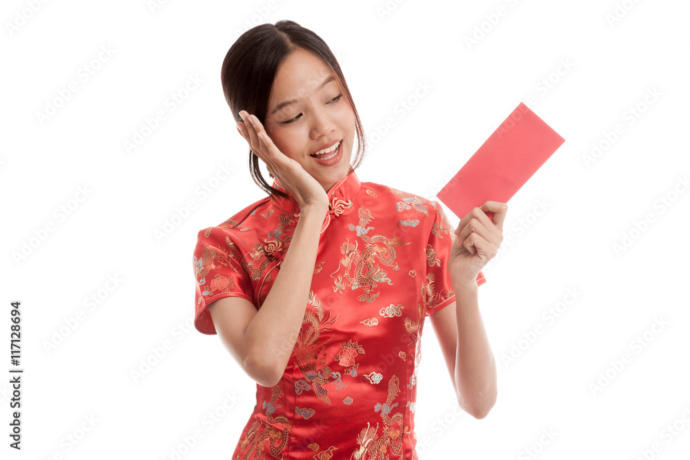 Asian girl in chinese cheongsam dress with red envelope Asian girl in chinese cheongsam dress with red envelope