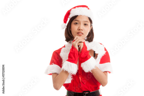 Asian Christmas Santa Claus girl is praying