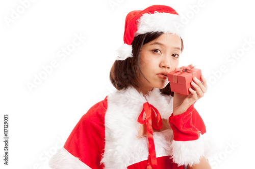 Asian Christmas Santa Claus girl  kiss a  gift box