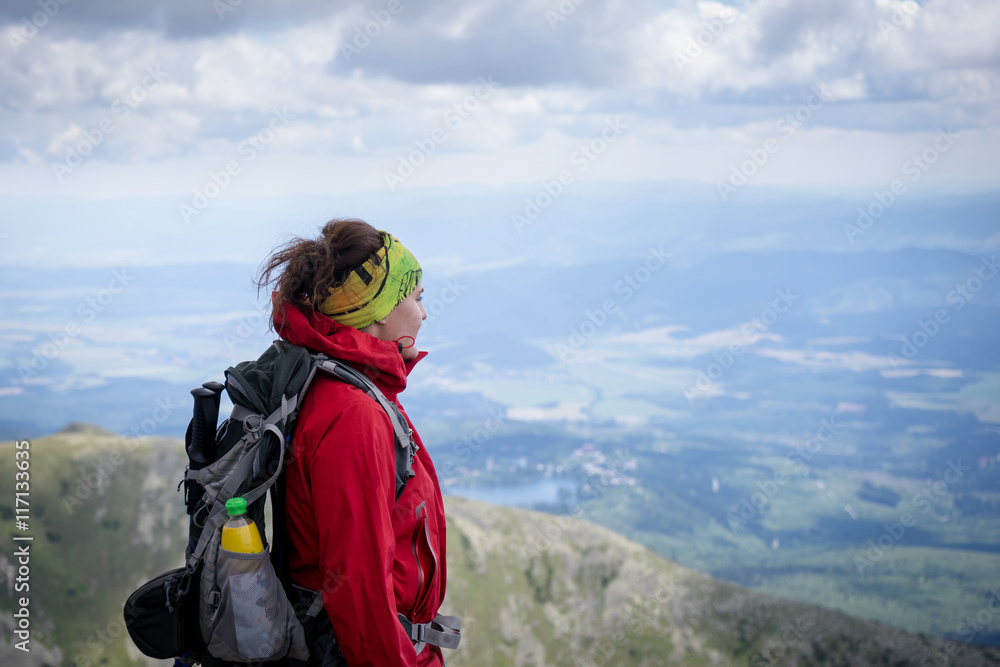Female hikers enjoying scenic view in High Tatras. Hiking in Slovakia mountains.