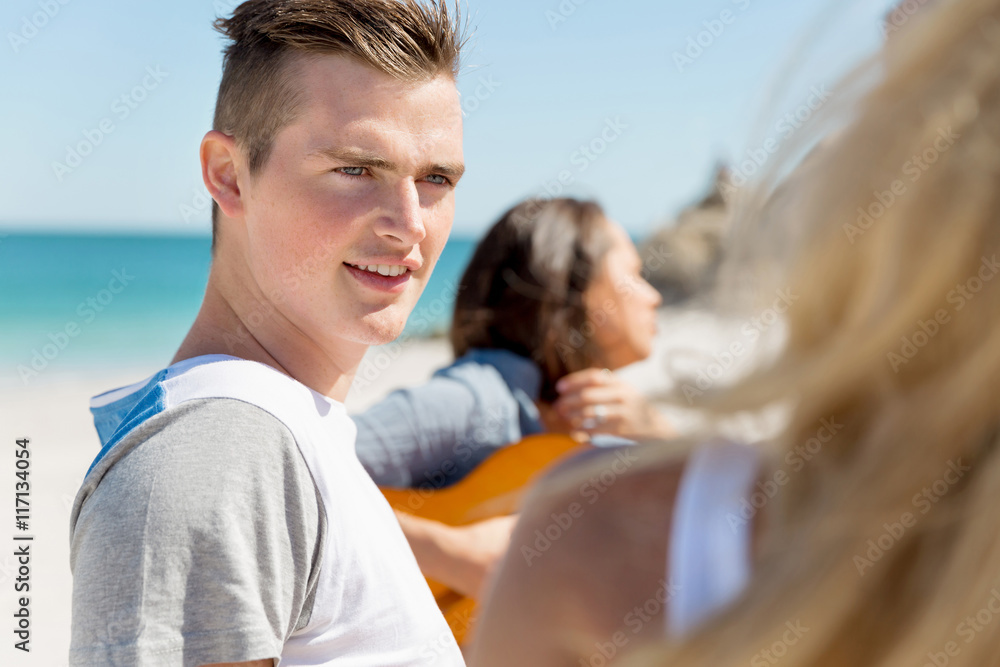 Portrait of young man on beach