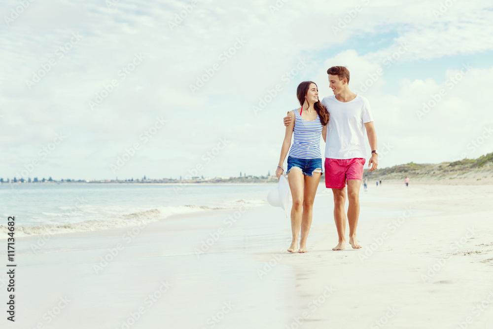 Romantic young couple on the beach