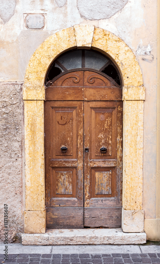 Old weathered wooden doors in Italy 
