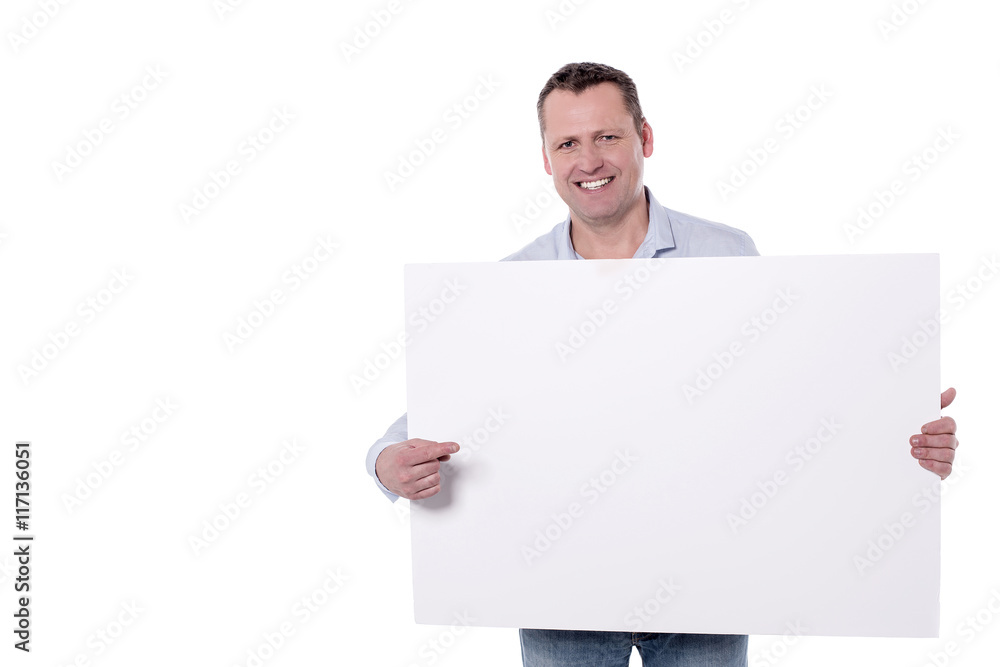 Man holding ad board. Pointing towards it. Man holding ad board. Pointing towards it.