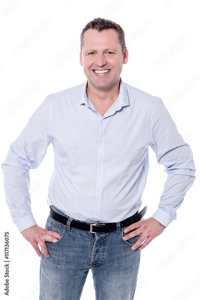 Handsome smiling guy posing casually